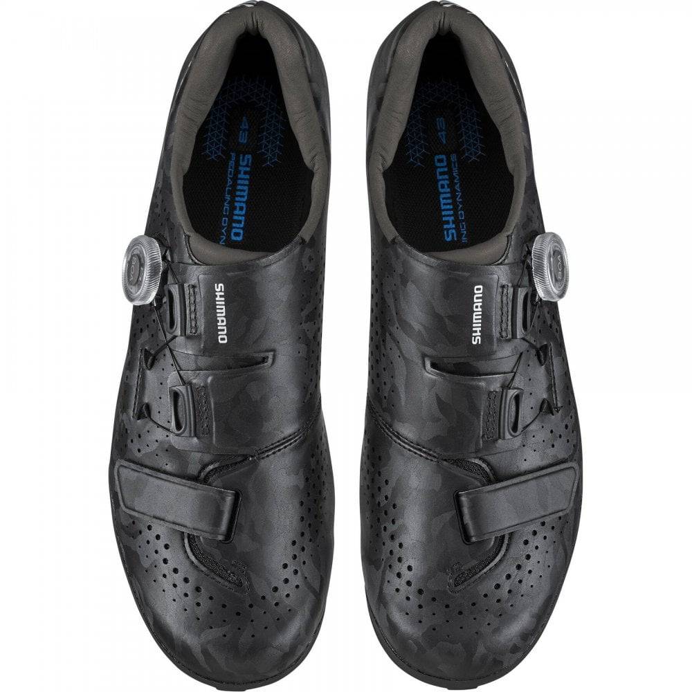 Shimano RX6 gravel cycling shoes with BOA L6 dial and carbon sole, featuring a sleek design and secure fit for riding.