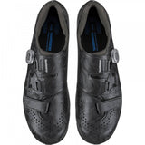 Shimano RX6 gravel cycling shoes with BOA L6 dial and carbon sole, featuring a sleek design and secure fit for riding.