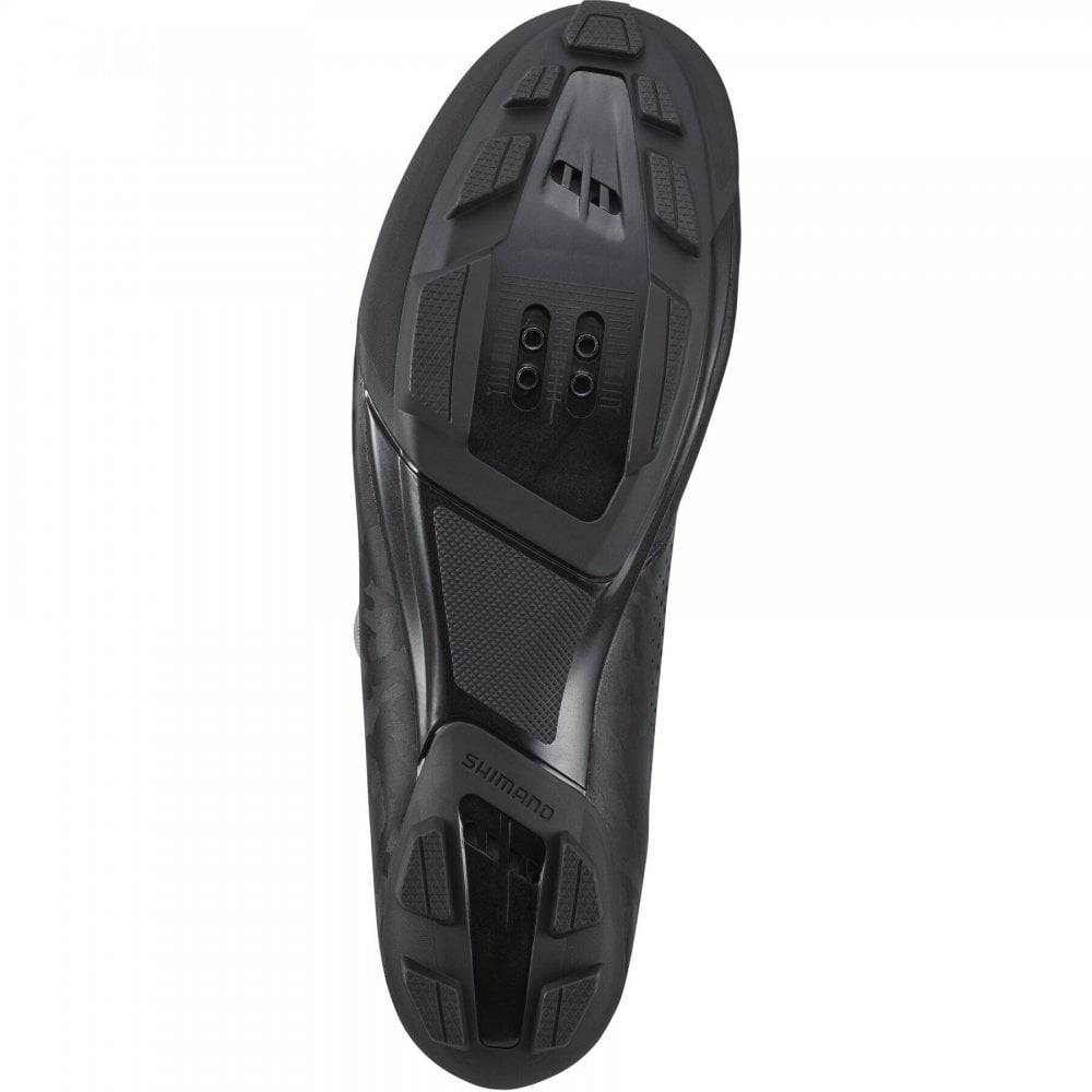 Shimano RX6 gravel cycling shoes with BOA L6 dial and carbon sole, shown in a close-up view highlighting the design.