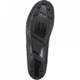 Shimano RX6 gravel cycling shoes with BOA L6 dial and carbon sole, shown in a close-up view highlighting the design.