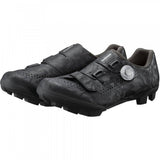Shimano RX6 gravel cycling shoes with BOA L6 dial, carbon sole, and breathable upper for off-road biking comfort.
