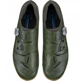 Shimano RX6 gravel cycling shoes with BOA L6 dial and carbon sole, shown in black with secure closure and rugged design.