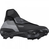 Shimano MW7 GORE-TEX MTB shoes with BOA L6 closure and reflective details, designed for mountain biking.