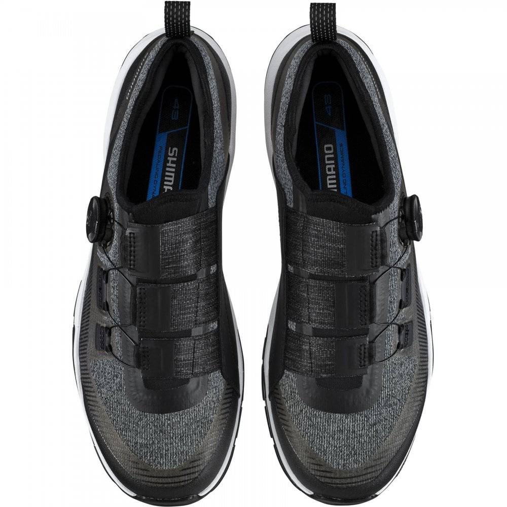 Shimano EX7 black mountain biking shoes with BOA L6 dial and ULTREAD EX outsole, designed for rugged MTB riding.