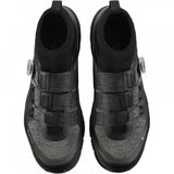 Shimano EX7 GORE-TEX waterproof mountain bike shoes with rugged footwear design for MTB riding.