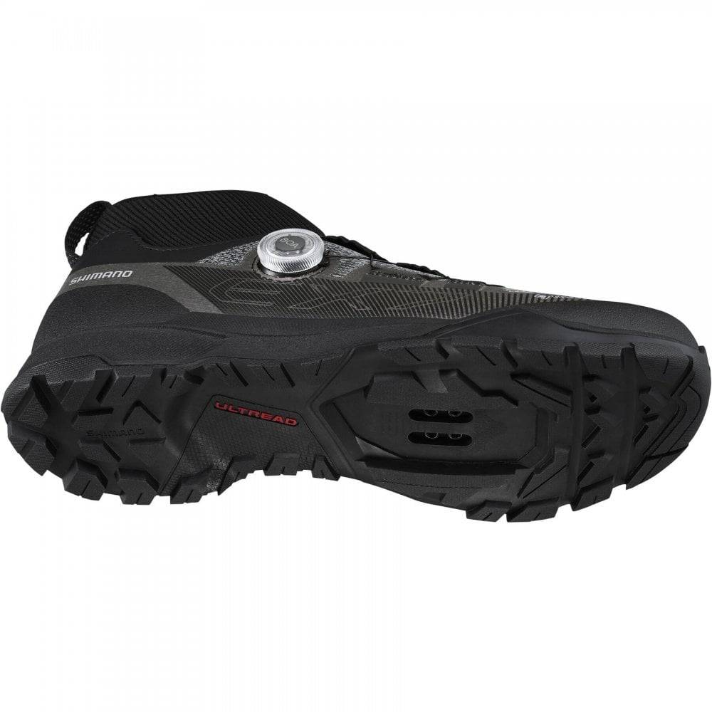 Shimano EX7 GORE-TEX waterproof mountain bike shoes with rugged design and secure lacing for MTB riding.