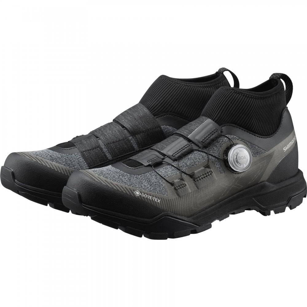 Shimano EX7 GORE-TEX waterproof mountain bike shoes with rugged outsole and secure lacing for MTB riding.