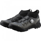 Shimano EX7 GORE-TEX waterproof mountain bike shoes with rugged outsole and secure lacing for MTB riding.