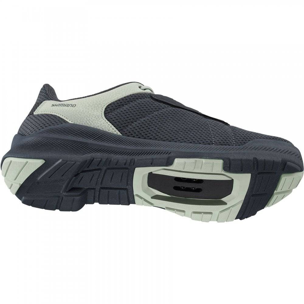 Shimano EX3W women's MTB cycling shoes in black with Velcro straps, designed for comfort and durability in mountain biking.