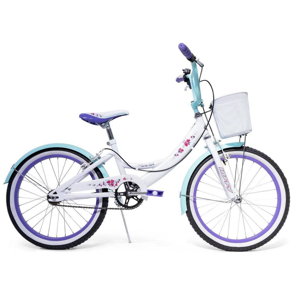 Huffy Girly Girl 20-inch kids bike in white with basket and padded seat, ideal for children aged 5 to 9.