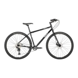 Surly Bridge Club 700c touring bike with drop handlebars and rugged tires, ideal for multi-surface adventure cycling.