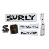 Surly MDS Dropouts spares and accessories with headbadge for bike frames, showcasing metal components and branding details.