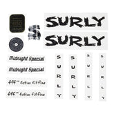 Surly Robinson dropouts replacement bike components with headbadge, showing metal parts on a bike frame for easy installation.
