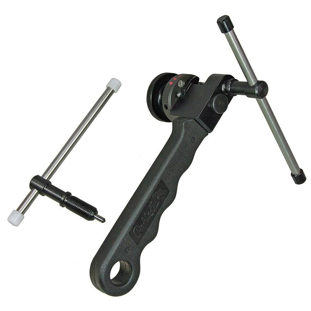 Rohloff Revolver 3 chain tool hub spares with case for single to 11-speed chains, mounted on a workbench.