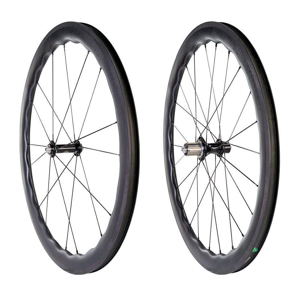 Princeton CarbonWorks Peak 4550 rim brake wheels for road cycling, featuring lightweight carbon rims and White Industries hubs.