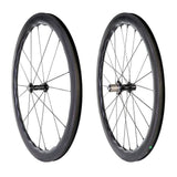 Princeton CarbonWorks Peak 4550 rim brake wheels for road cycling, featuring lightweight carbon rims and White Industries hubs.