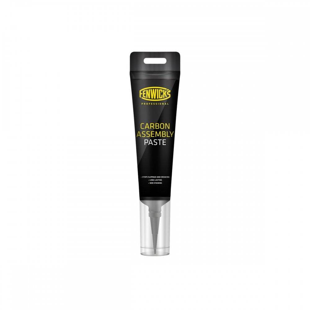 Fenwick's Professional Carbon Assembly Paste 80ml for seatposts, handlebars, and stems, shown in a workshop setting.