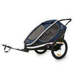 Hamax Outback Twin Child Bike Trailer with suspension and safe connection point, designed for family cycling accessories.