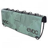 EVOC Travel Tailgate Pad for pickup trucks, secure bike transport accessory with padded protection for outdoor cycling gear.