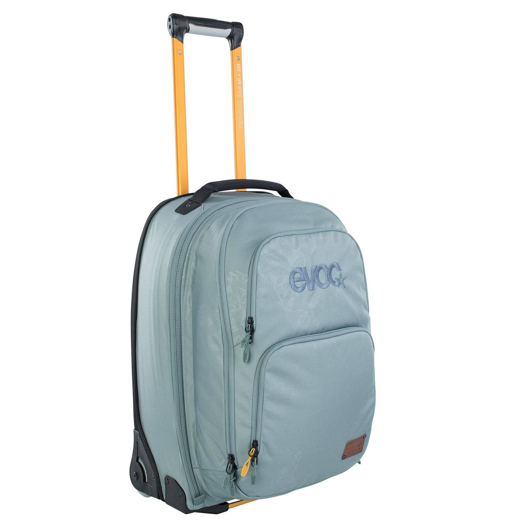 EVOC travel terminal bag with 40L main compartment, detachable 20L daypack, and trolley wheels for easy transport.