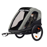 Hamax Avenida One child bike trailer and stroller with safety harness and durable fabric, designed for toddler transportation.
