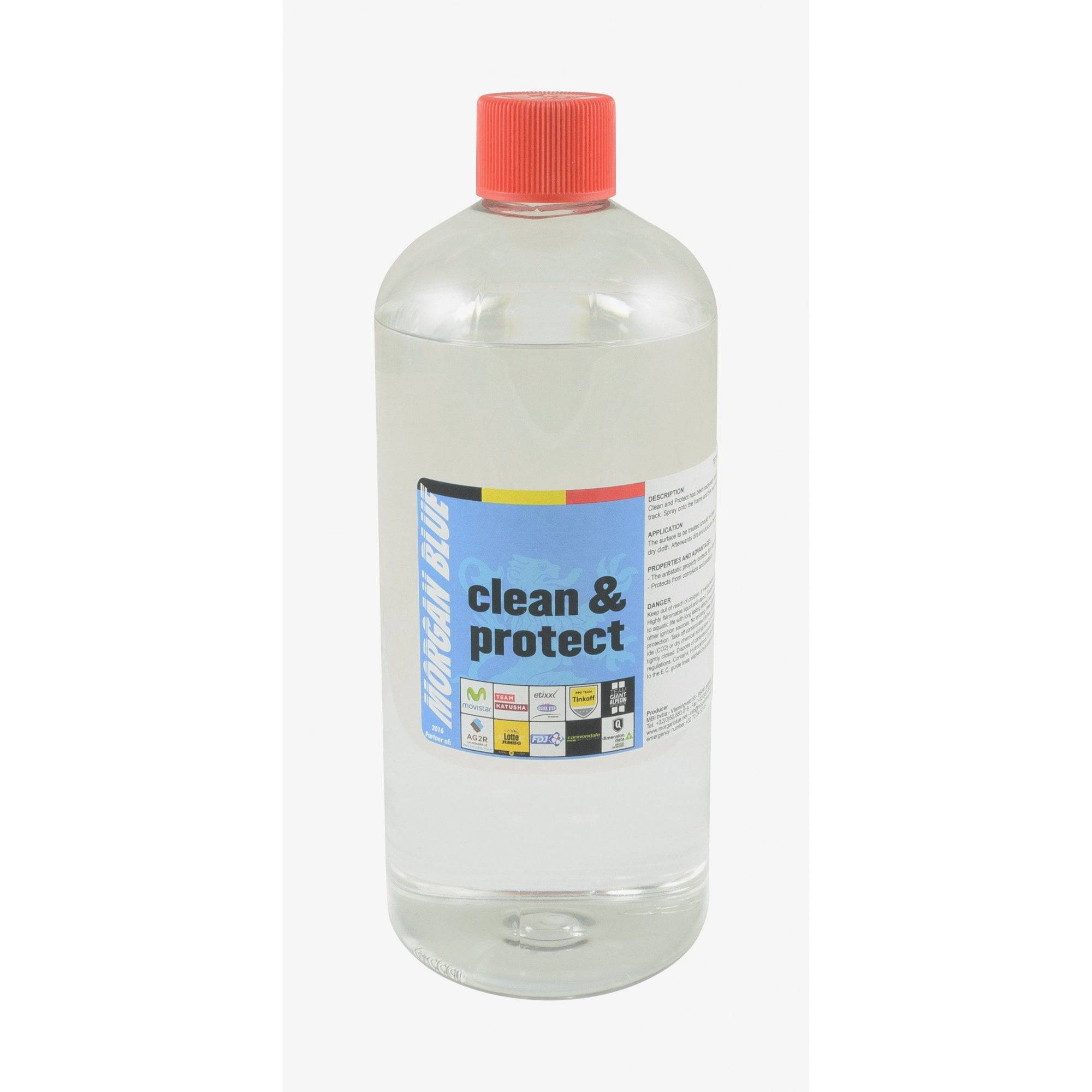 Morgan Blue Clean & Protect bike frame spray for MTB and cyclocross, shown in a workshop setting for bike maintenance.