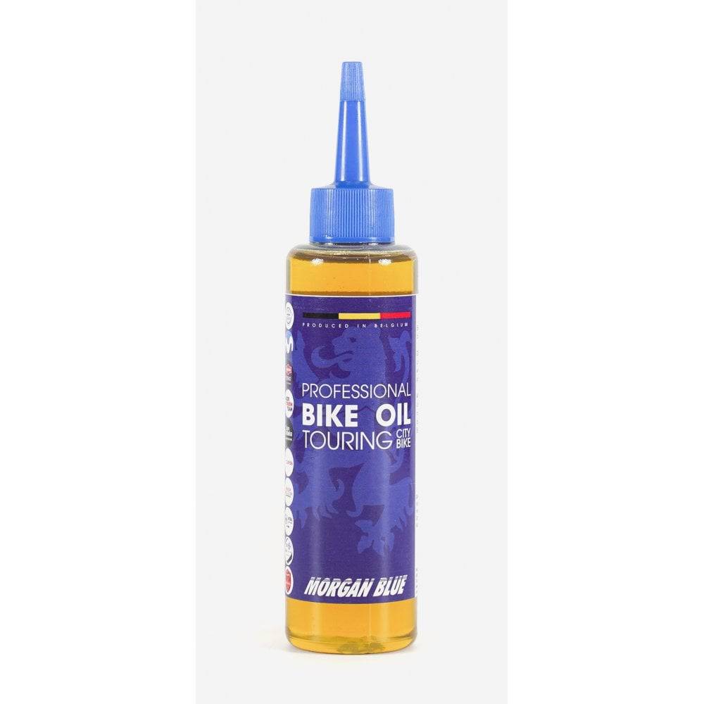 Morgan Blue bike oil lubrication for touring and city bike chains and drivetrains, used in workshop maintenance.