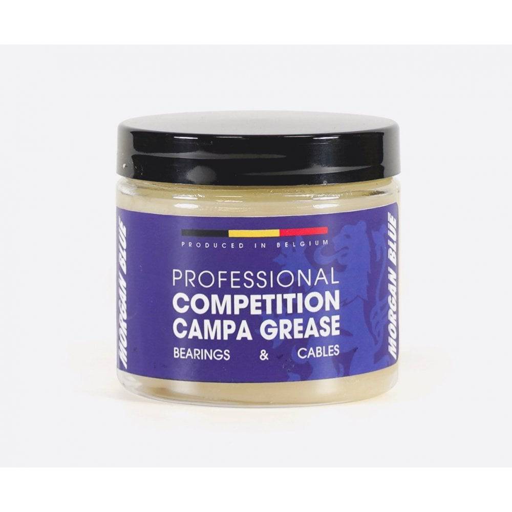 Morgan Blue Competition Campa grease in a workshop setting, used for lubricating bicycle hubs and bottom brackets.