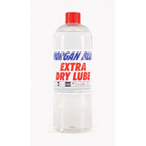 Morgan Blue Extra Dry Lube MTB and cyclocross bike chain lubrication spray shown in a workshop setting.
