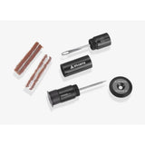 Granite workshop tire plug kit with orange puncture repair plugs and hidden handlebar storage for easy roadside repairs.