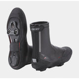 BBB RainFlex overshoes shoe covers, waterproof cycling protection, showing black waterproof fabric and reflective details.