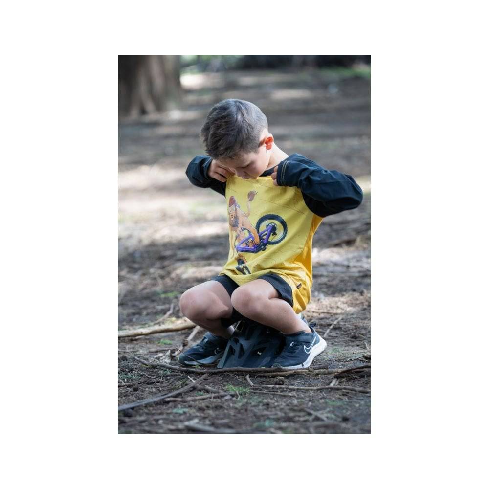 Kids Ride Shotgun unisex yellow Lion Windproof Jersey for kids aged 2-6 years, lightweight and durable outdoor clothing.