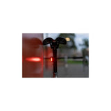Knog Frog V3 rechargeable bike light set in denim blue, front and rear lights for bicycles, with compact, waterproof design.