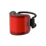 Knog Lil' Cobber bike light with 330° visibility, USB rechargeable, waterproof design, attached to a bicycle handlebar.