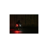 Knog Lil' Cobber bike lights showing waterproof design, USB charging port, and 330° visibility on a bicycle handlebar.