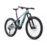 Liv Intrigue X Advanced E+ EL 2 women's electric mountain bike with SyncDrive Pro motor, black frame and rugged tires.