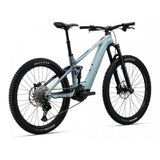 Liv Intrigue X Advanced E+ EL 2 women's electric mountain bike with SyncDrive Pro motor, ready for off-road adventure.
