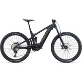 Giant Trance X Advanced E+ 2 electric mountain bike with full suspension, black frame, and mountain tires, ready for off-road riding.