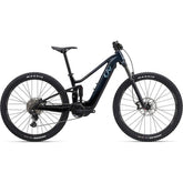Liv Embolden E+ 2 625 women's electric mountain bike with suspension, 25km/h speed, and 180km range, shown outdoors.
