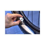 Squirt SEAL Tyre Sealant with BeadBlock for puncture protection on tubed and tubeless wheels in workshop setting