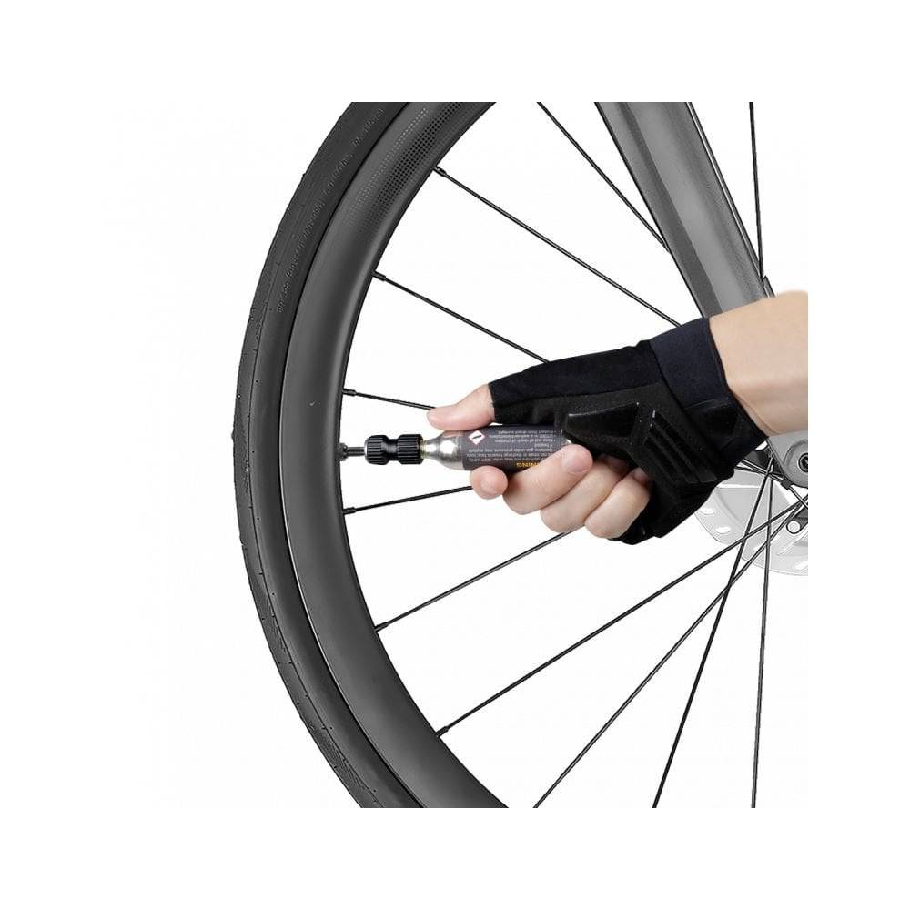 Topeak AirBooster Nano CO2 inflator for Presta and Schrader valves, compact black bicycle pump accessory.