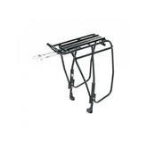 Topeak Uni Super Tourist DX disc rear bike rack on a touring bike, black, designed for mountain and touring bikes.