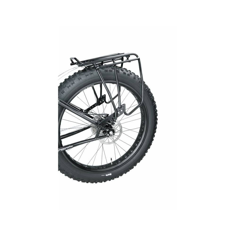 Topeak Uni Super Tourist fat bike disc brake rack with MTX QuickTrack compatibility, mounted on a fat bike for accessories.