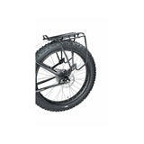 Topeak Uni Super Tourist fat bike disc brake rack with MTX QuickTrack compatibility, mounted on a fat bike for accessories.