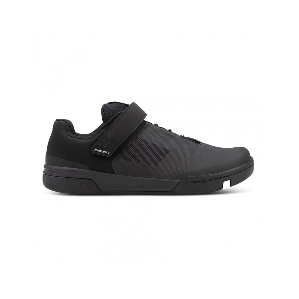 Crank Brothers Stamp Speedlace MTB shoes with flat pedal design, black mountain biking footwear with Speedlace closure system.