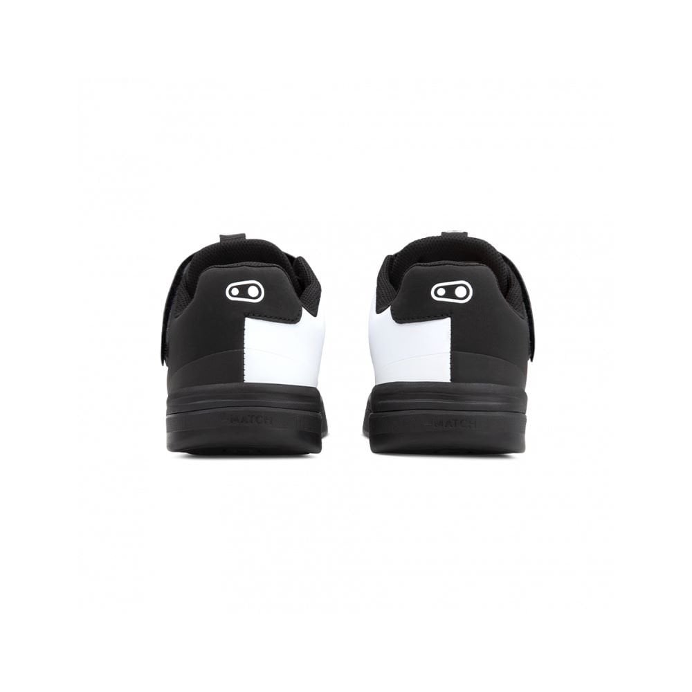Crank Brothers Stamp Speedlace MTB shoes in black for flat pedal mountain biking, showing the durable outdoor footwear.