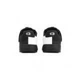 Crank Brothers Stamp Speedlace MTB shoes in black for flat pedal mountain biking, showing the durable outdoor footwear.