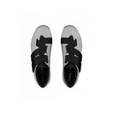 Fizik X4 Terra MTB shoes for gravel and mixed-terrain cycling, showing black and gray cycling footwear with Powerstrap closure system.