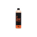 Orange Seal tubeless sealant refill for bike tires, providing puncture protection for tubeless bicycle wheel setups.