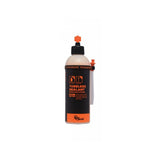 Orange Seal tubeless sealant with injector for fast puncture repair, designed for bicycle tires and components.